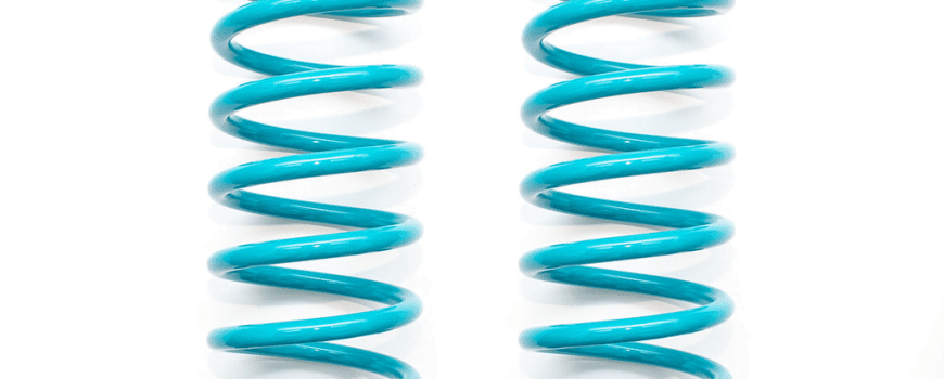 Dobinsons rear coil springs in teal color