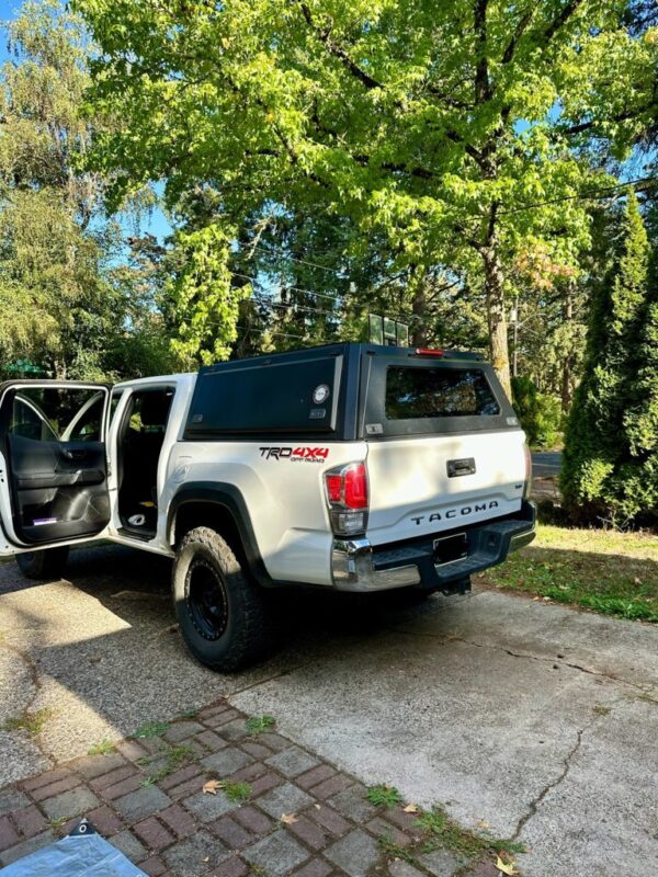 Expedition Truck Cap with Full Wing Doors installed on a Toyota Tacoma 2016-2023 5ft Bed